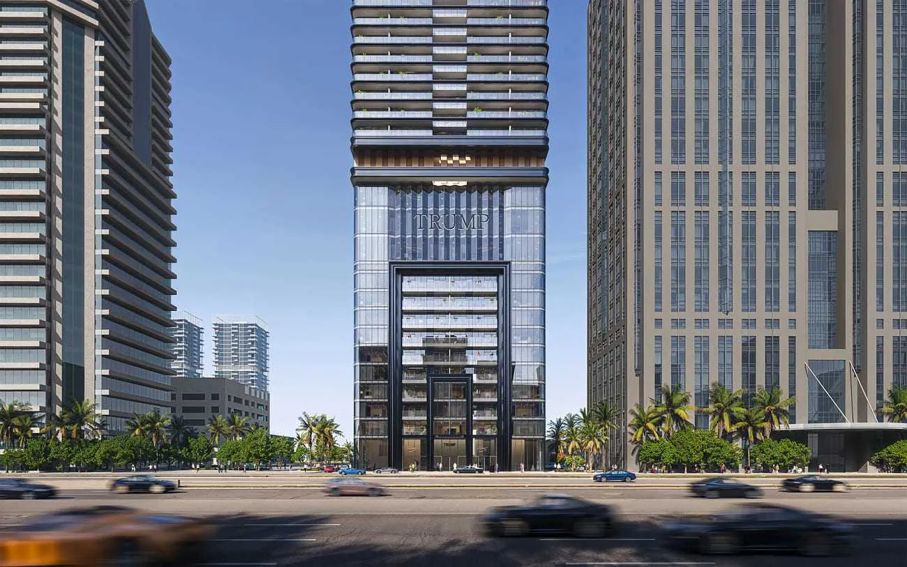 High-end luxury tower overlooking a bustling roadside with moving cars