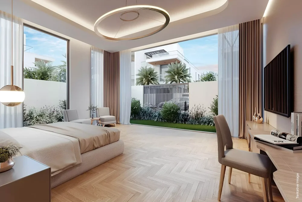 Luxury bedroom opening to a lush outdoor greenery space